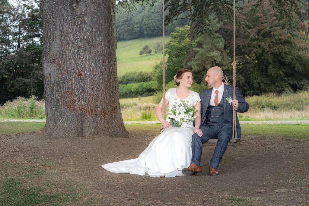 Moment to reflect for newlyweds, captured by wedding photographer at Hackness Grange.