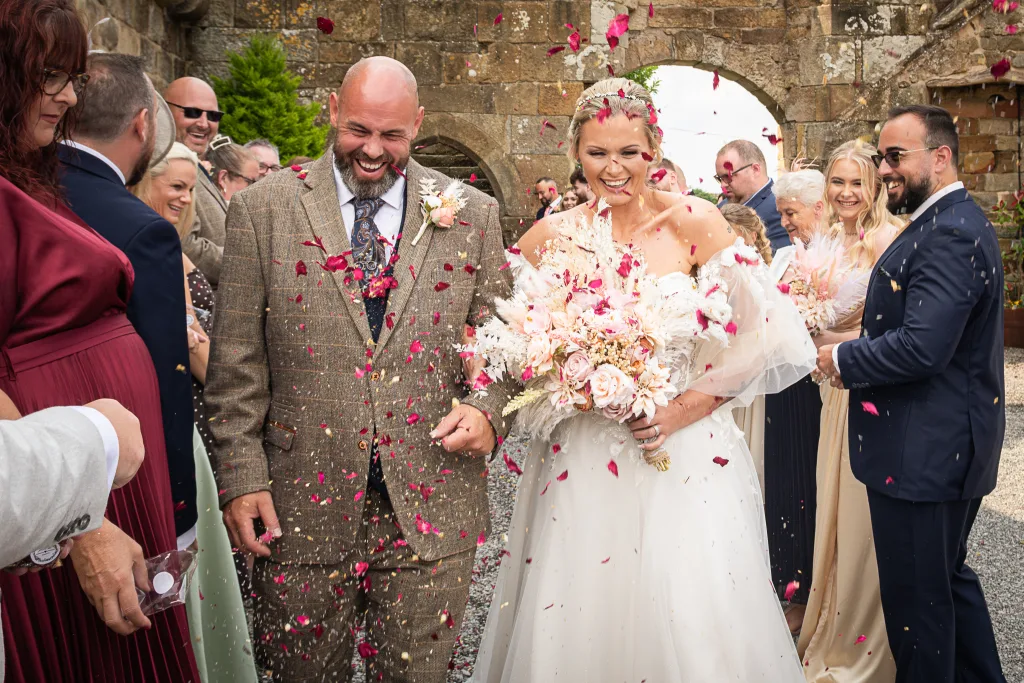 Bride and Groom Captured at Danby Castle Barn by Wedding Photographer Darren Cartledge Photography