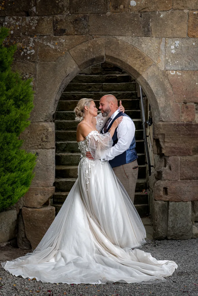 Bride and Groom Captured by wedding photographer at Danby Castle Barn