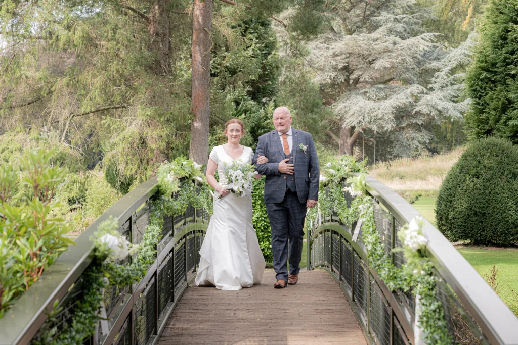 Brides arrival captured by Hackness Grange wedding photographer.
