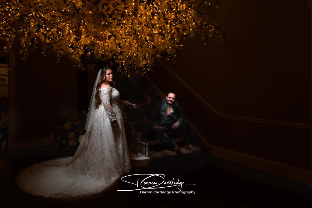 Couple together at twilight outside Bawtry Hall wedding venue in South Yorkshire