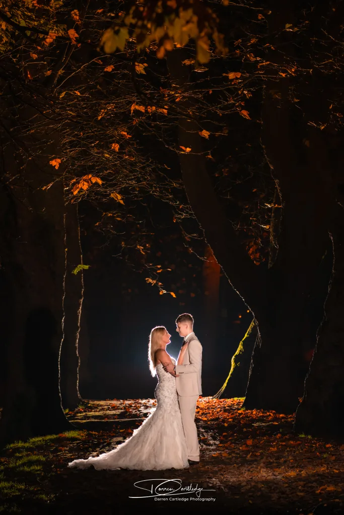 Bride and groom captured in a romantic twilight portrait in York during a Yorkshire wedding