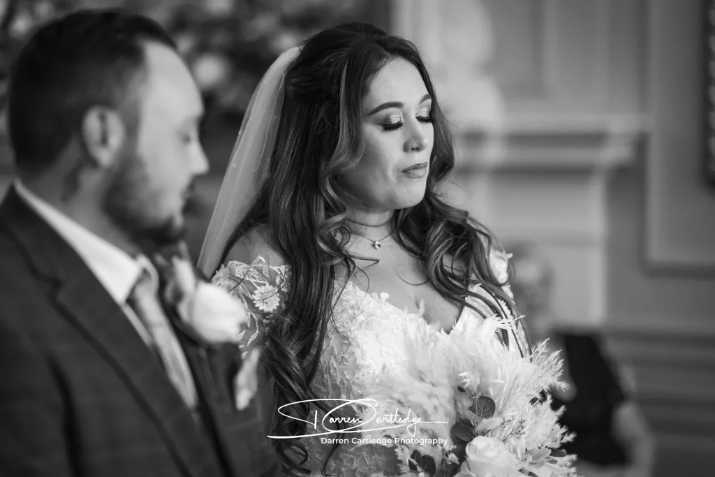 Bride composing herself during the wedding ceremony at a Yorkshire wedding