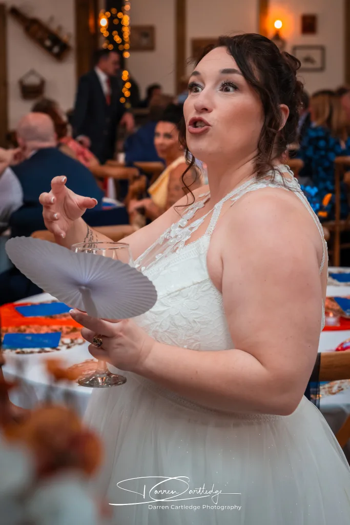 Bride looking surprised at Clapham Holme Farm during a Yorkshire wedding