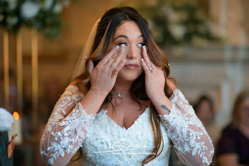 bride-wiping-tears-ceremony-yorkshire-wedding