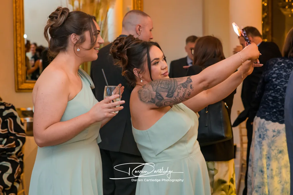 Bridesmaids taking a selfie at Bawtry Hall during a Yorkshire wedding