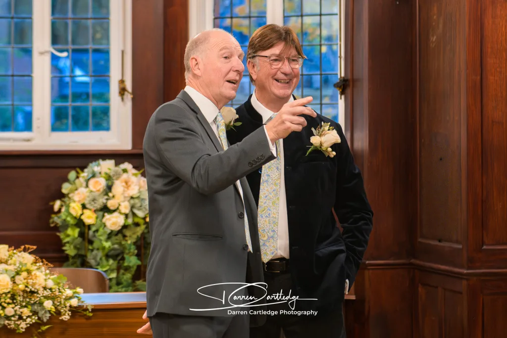 Candid moment of groom and best man during a Yorkshire wedding