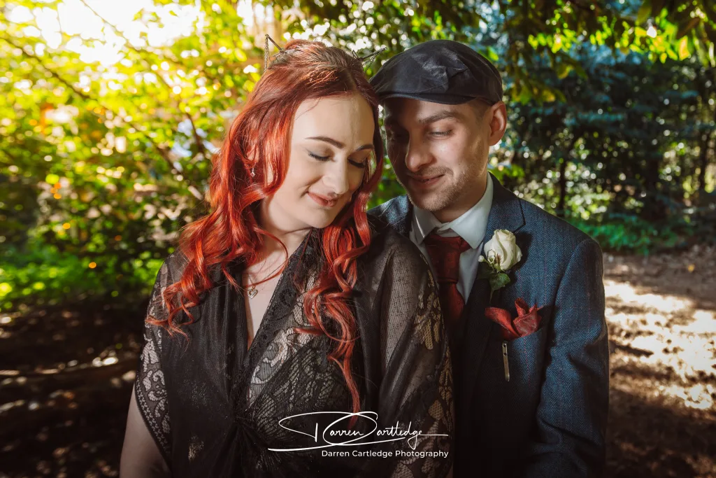 Close-up of bride and groom in the woodland at Hazlewood Castle during a Yorkshire wedding