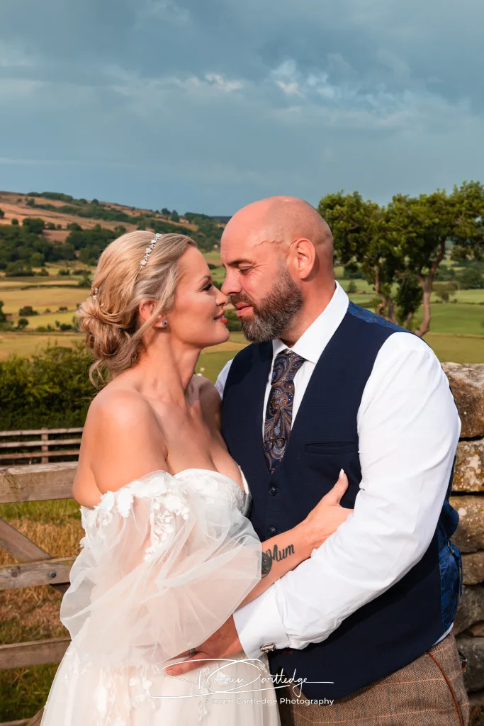 Bride and groom gazing into each other’s eyes at Danby Castle during a Yorkshire wedding