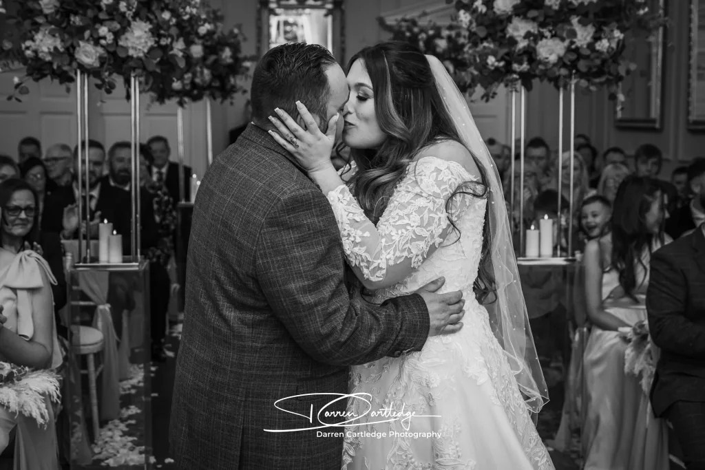 Leeann and Johnathan sharing their first kiss as a married couple at Bawtry Hall, Yorkshire