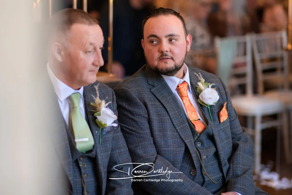 Groom chatting with best man before the wedding ceremony at a Yorkshire wedding