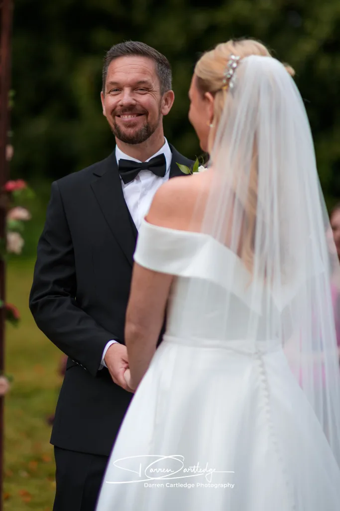 Groom laughing and looking at the camera during a Yorkshire wedding