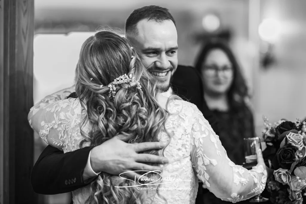 Guest hugging the bride after the ceremony at a Yorkshire wedding