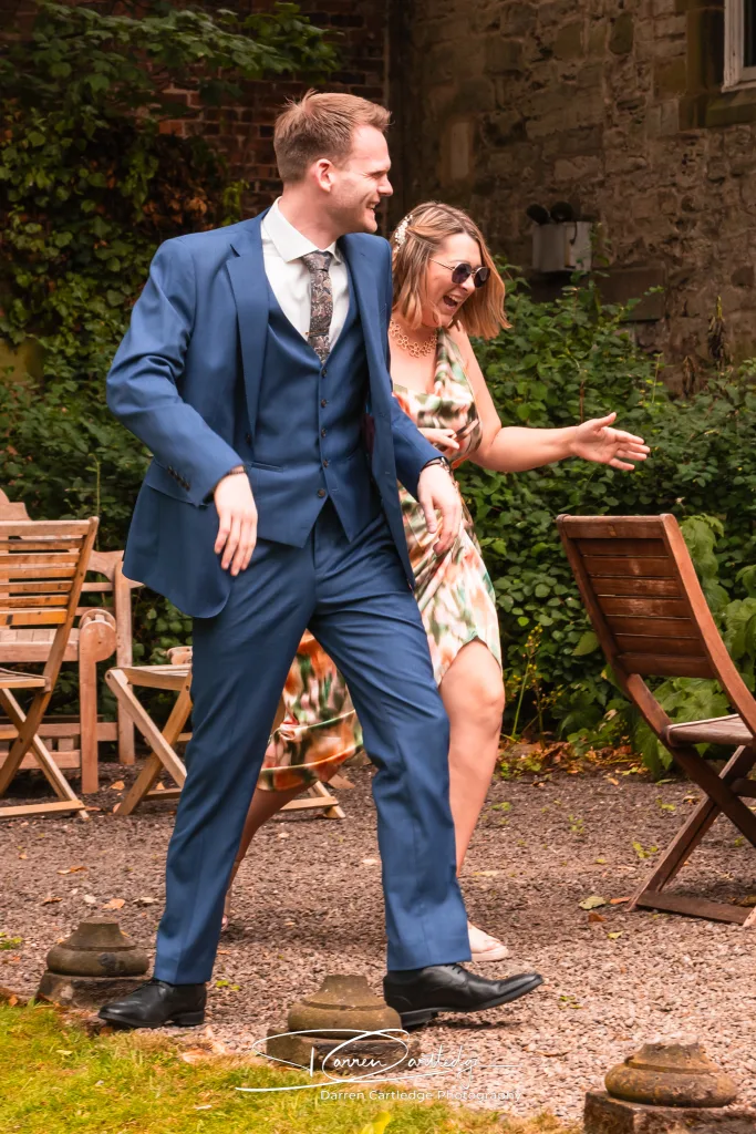 Wedding guests having fun at The Old Deanery in Ripon during a Yorkshire wedding