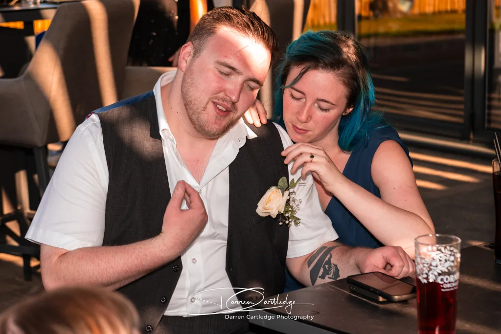 Wedding guests relaxing at Willerby Barn during a Yorkshire wedding
