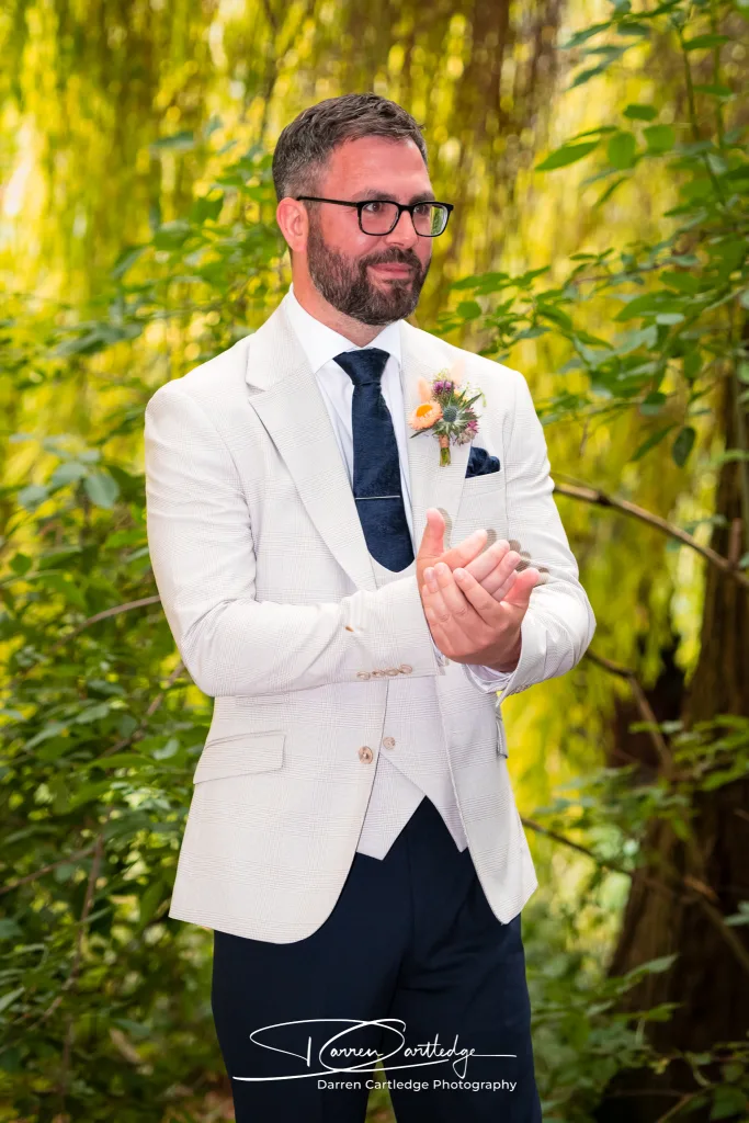 Nervous groom moments before the outdoor wedding ceremony at a Yorkshire wedding