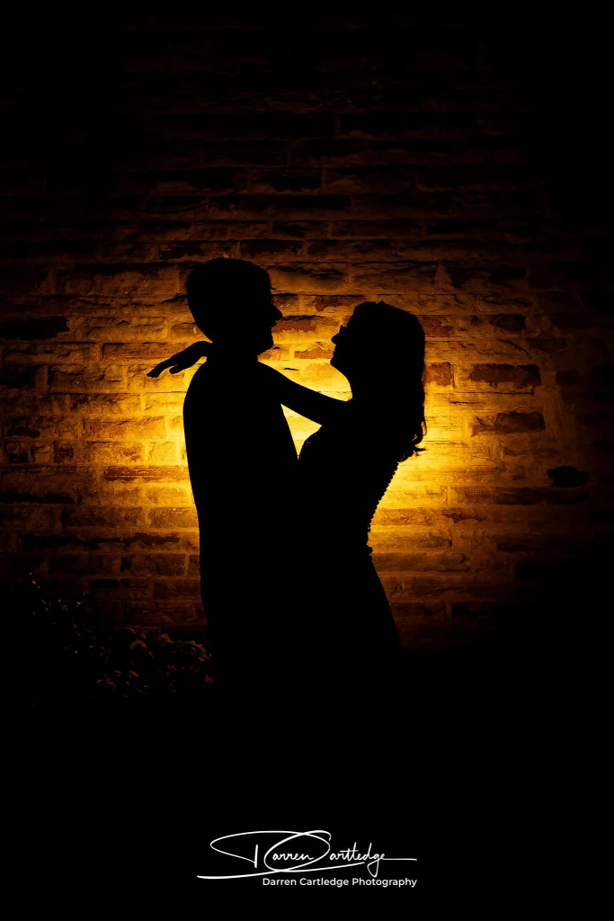 Silhouette of couple at twilight outside The Tempest Arms in Skipton, Yorkshire