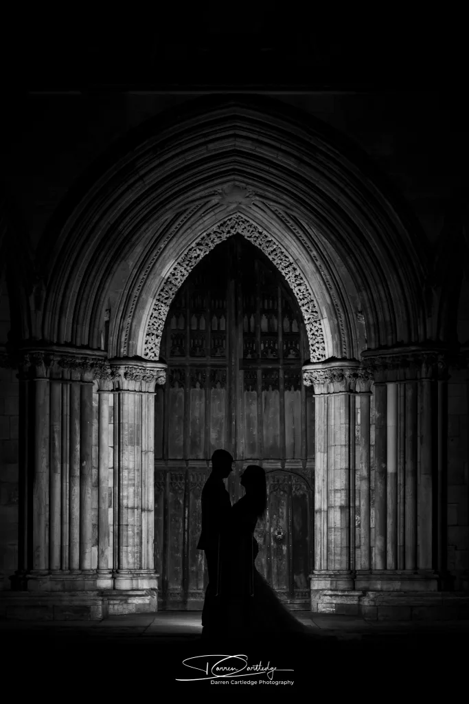 Silhouette of a couple at York Minster in Yorkshire