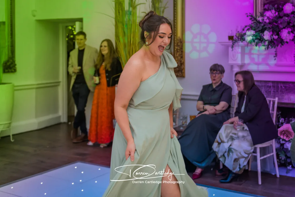 Bridesmaid owning the dancefloor at a Bawtry Hall wedding in South Yorkshire