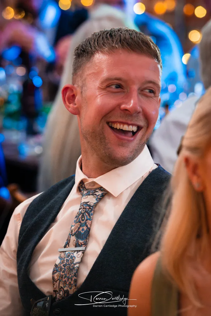 Candid moment of a wedding guest at Howard Court during a Yorkshire wedding