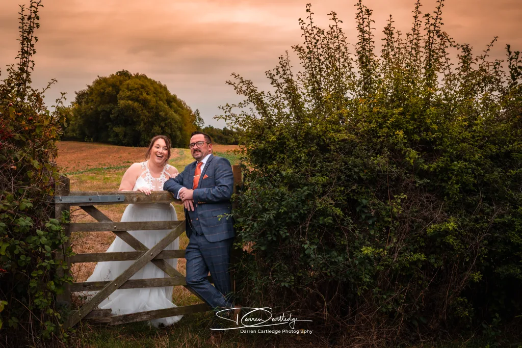 Bride and groom together at dusk during a barn wedding at Clapham Holme Farm, East Yorkshire